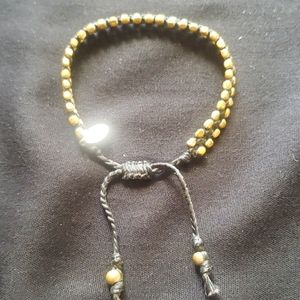 Adjustable Tai woven bracelet
